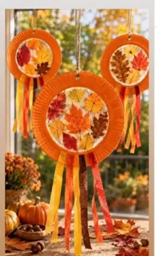 Blätter-Sonnenfänger aus einem Papptellerrand am Fenster