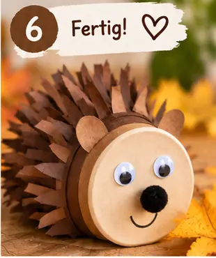 Schritt 6: Fertiger Pappbecher-Igel mit Papierstacheln und freundlichem Gesicht